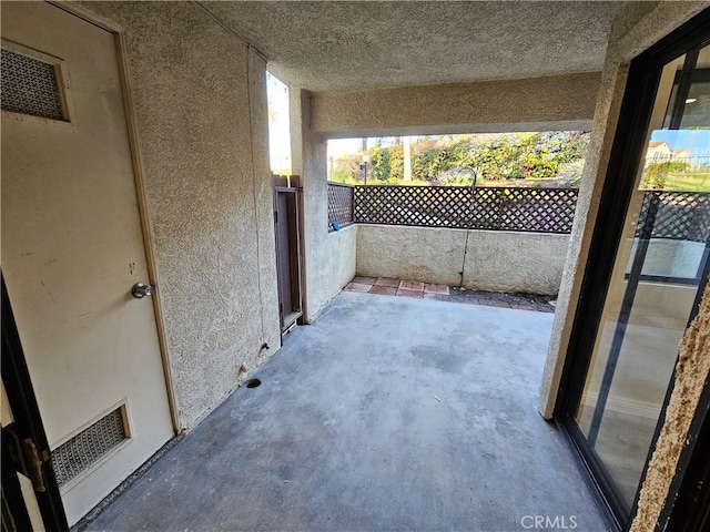 view of patio with visible vents