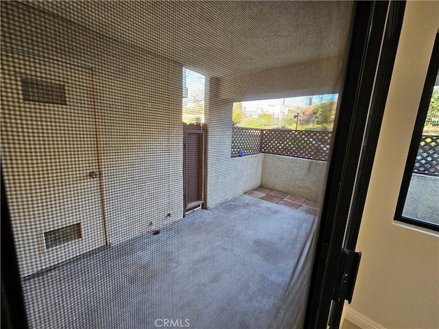 view of patio / terrace with a balcony