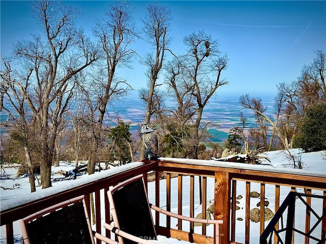 view of snow covered deck