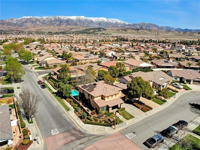 aerial view with a mountain view and a residential view