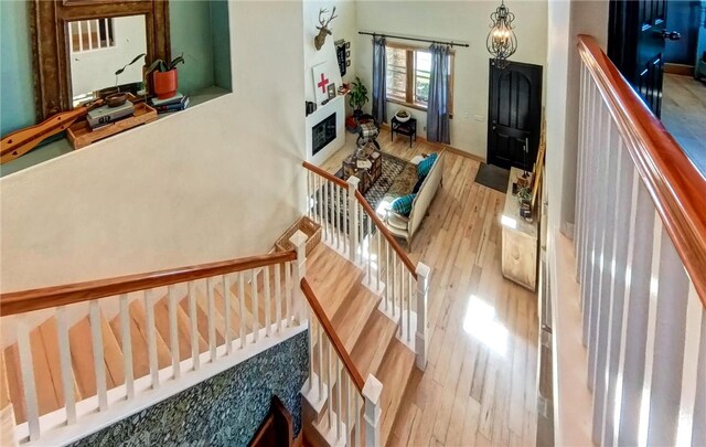 stairway with wood finished floors