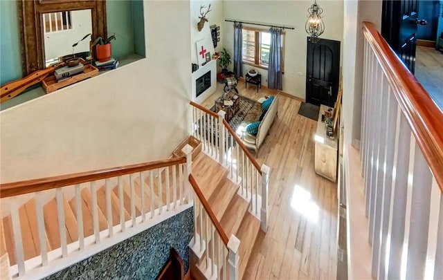 stairs with wood finished floors