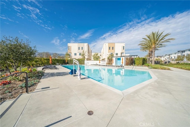 pool with a patio