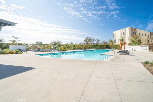 pool featuring a patio