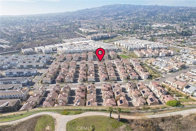 birds eye view of property with a residential view