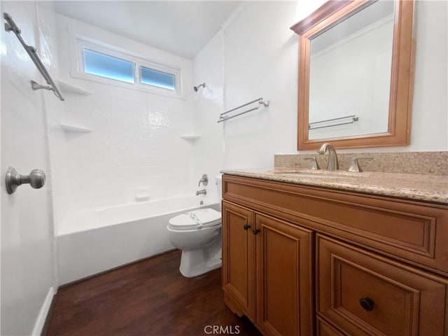 bathroom with shower / tub combination, toilet, vanity, and wood finished floors