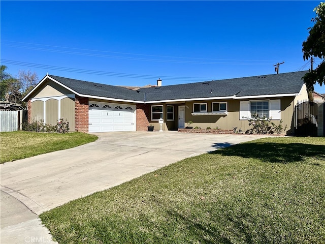 ranch-style home with brick siding, fence, a front yard, driveway, and an attached garage