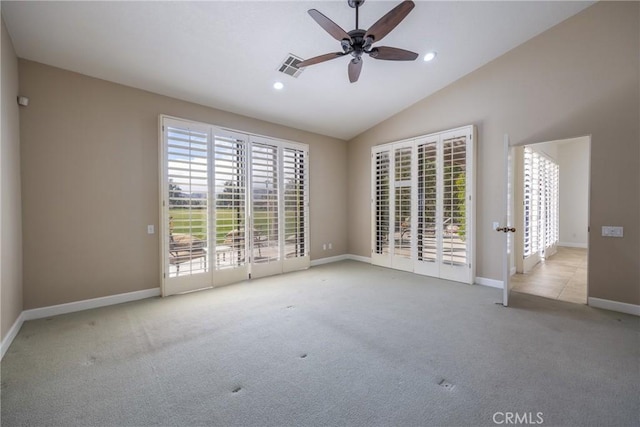 carpeted empty room with visible vents, baseboards, ceiling fan, recessed lighting, and vaulted ceiling