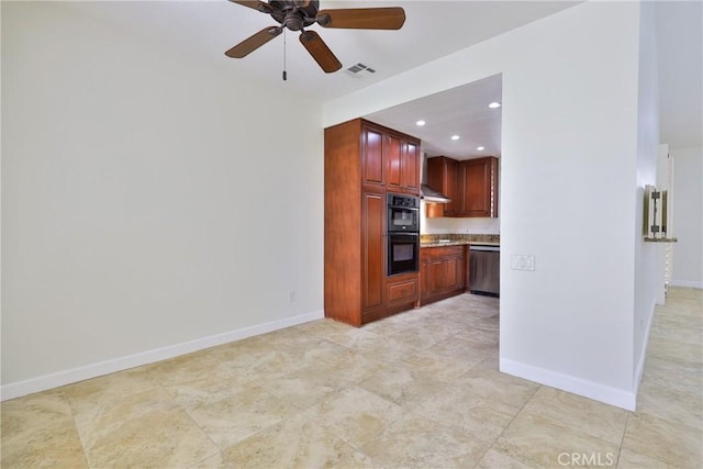 kitchen featuring visible vents, baseboards, dishwasher, and dobule oven black