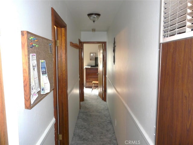 corridor featuring carpet floors