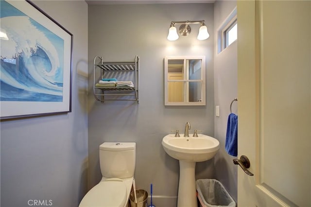 bathroom with a sink and toilet