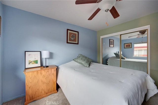 bedroom featuring carpet flooring, a closet, and ceiling fan