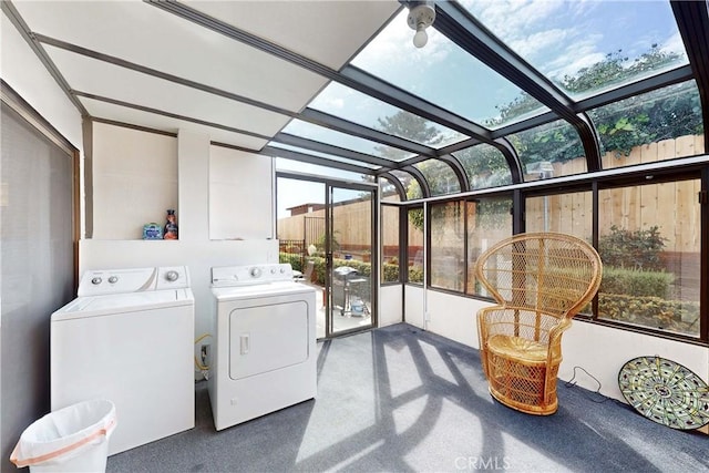 laundry area with separate washer and dryer, laundry area, and a sunroom