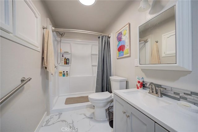 full bath featuring marble finish floor, a stall shower, vanity, and toilet