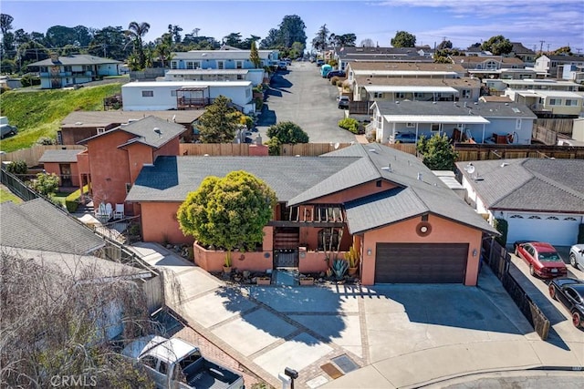 birds eye view of property with a residential view