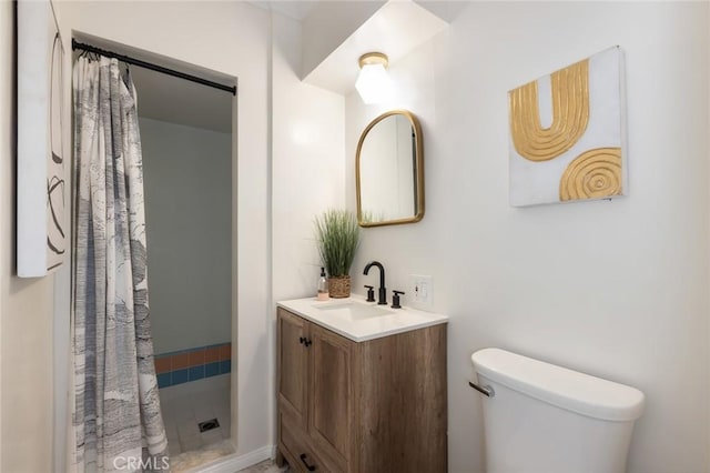 bathroom with a shower with shower curtain, toilet, and vanity