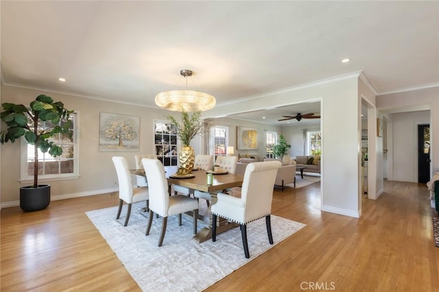 dining area featuring light wood-style flooring, recessed lighting, baseboards, and ornamental molding