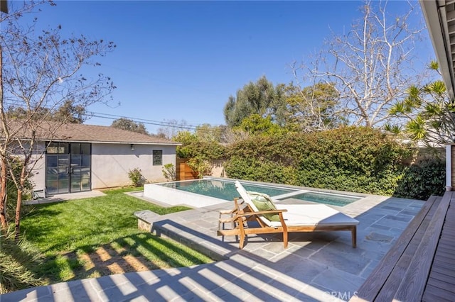 view of pool featuring a patio, a lawn, a fenced in pool, and a fenced backyard