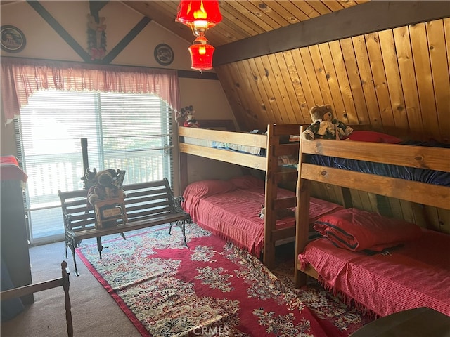 carpeted bedroom with lofted ceiling, multiple windows, and wood ceiling