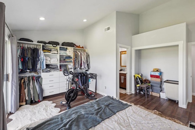 bedroom with recessed lighting, visible vents, and wood finished floors