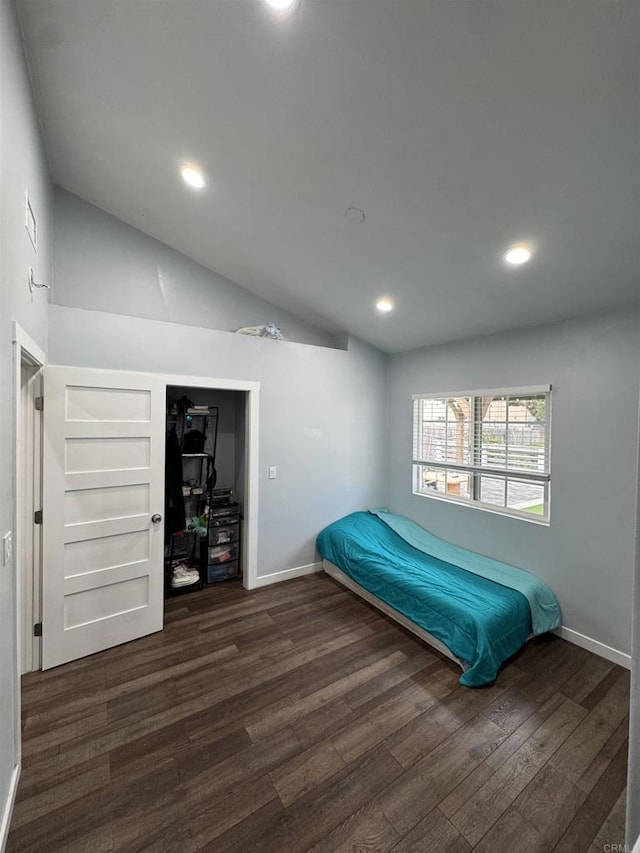 bedroom featuring recessed lighting, lofted ceiling, and dark wood-style flooring