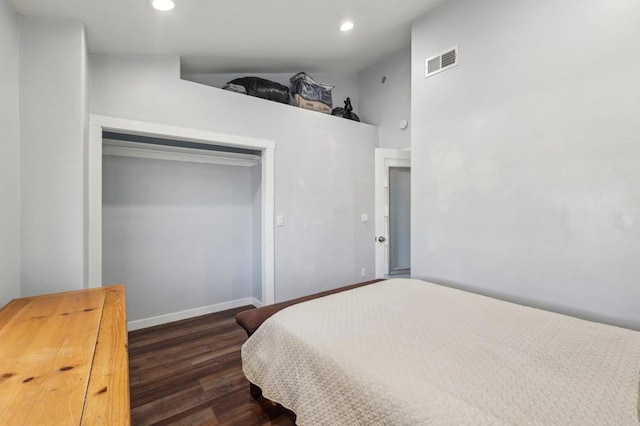 bedroom featuring visible vents, baseboards, dark wood finished floors, vaulted ceiling, and recessed lighting