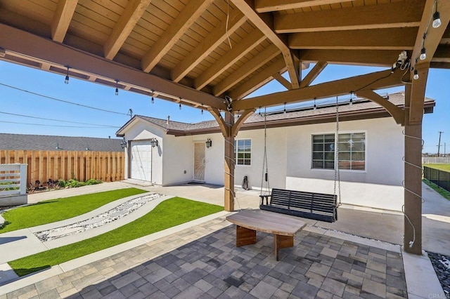 view of patio / terrace with fence