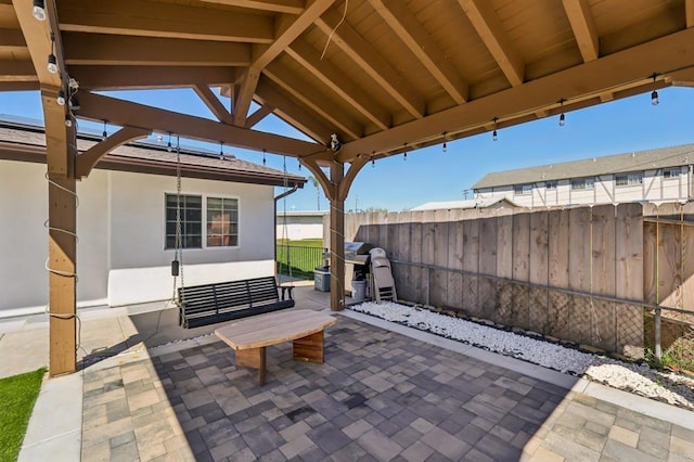 view of patio with fence