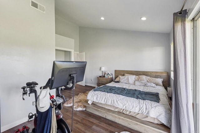 bedroom featuring visible vents, recessed lighting, baseboards, and wood finished floors