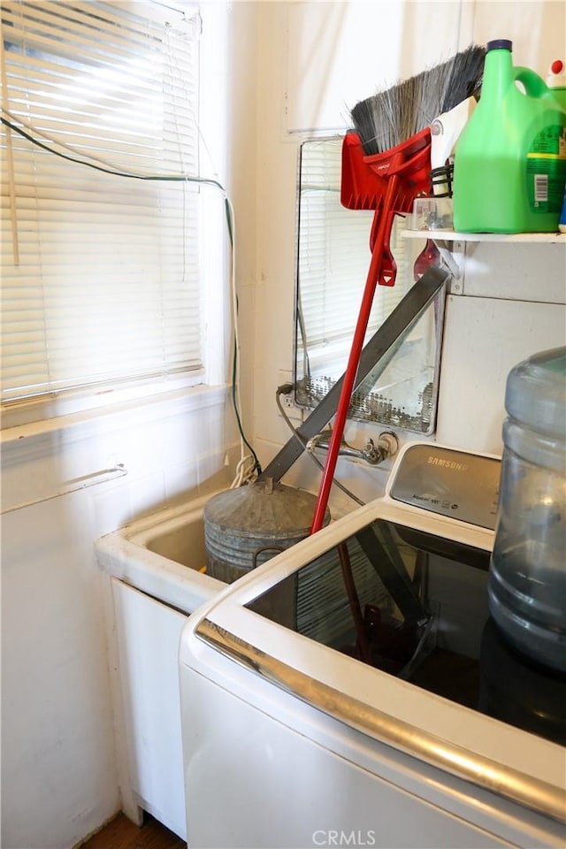 washroom featuring laundry area and washer / clothes dryer