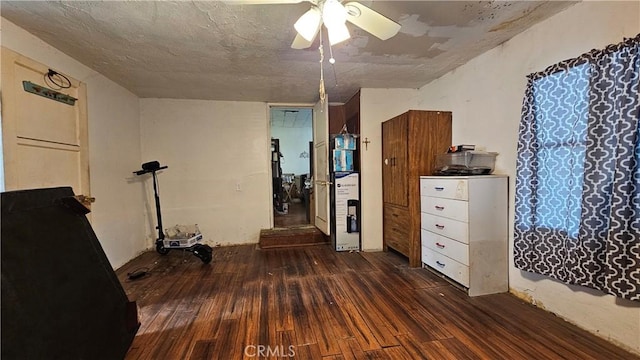 bedroom with ceiling fan and wood finished floors