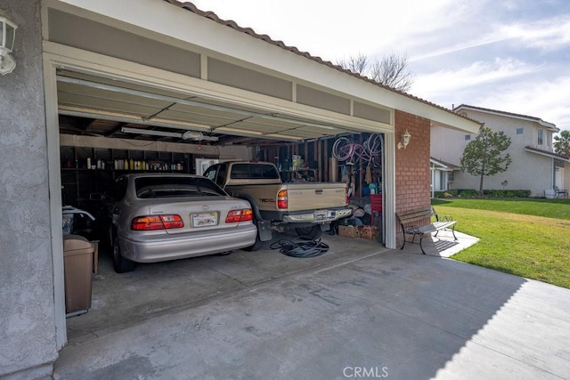 garage with driveway