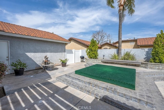 view of patio with a fenced backyard