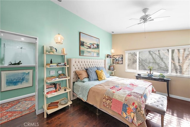 bedroom featuring hardwood / wood-style flooring and baseboards