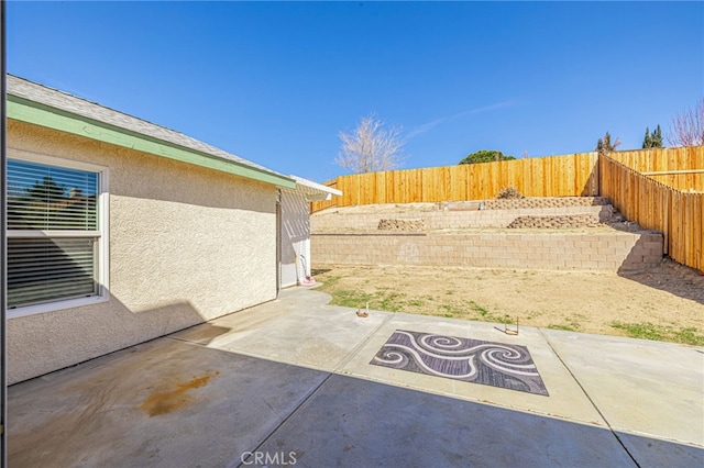 view of patio featuring a fenced backyard