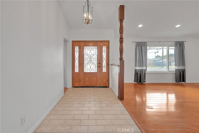 12460 Magnolia Ave, Chino, CA 91710 - foyer entrance featuring an inviting chandelier, baseboards, light wood-style flooring, and recessed lighting
