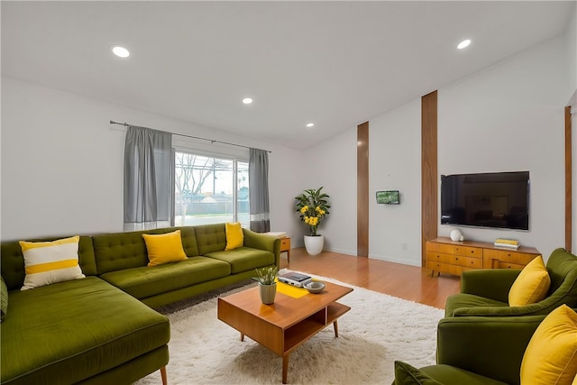 12460 Magnolia Ave, Chino, CA 91710 - living area with light wood-type flooring, baseboards, lofted ceiling, and recessed lighting