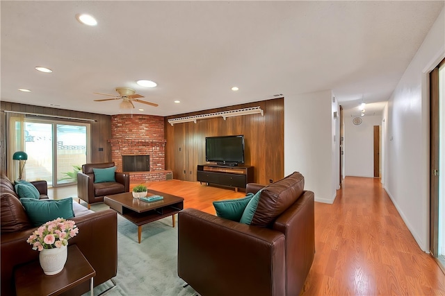12460 Magnolia Ave, Chino, CA 91710 - living room featuring a fireplace, light wood-style flooring, a ceiling fan, and recessed lighting