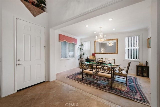 tiled dining area with a chandelier, recessed lighting, crown molding, and baseboards