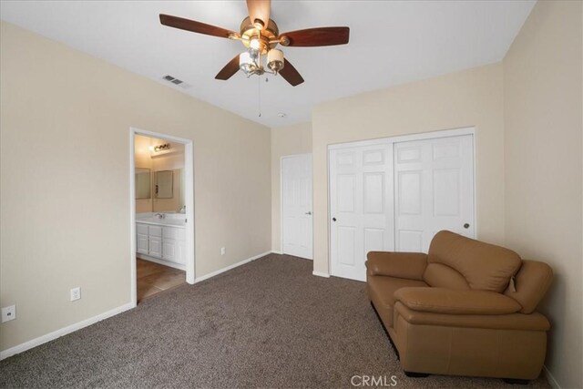 unfurnished room featuring visible vents, baseboards, carpet, and a ceiling fan