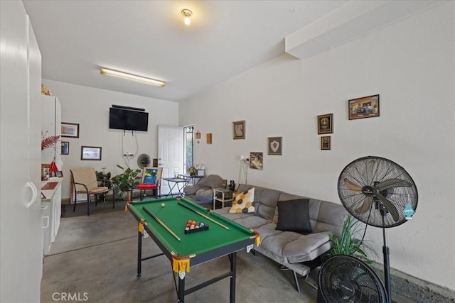 playroom with concrete floors and billiards