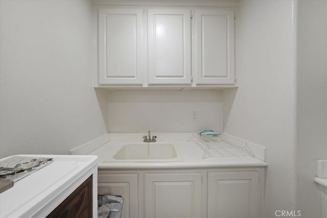 laundry room featuring a sink