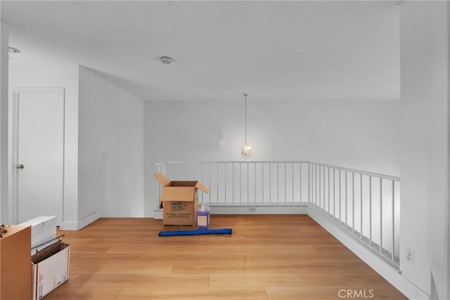 3119 Milano # J, Ontario, CA 91761 - interior space featuring an inviting chandelier and light wood-style floors