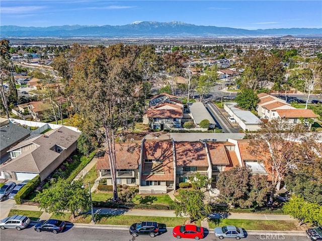 aerial view featuring a mountain view and a residential view