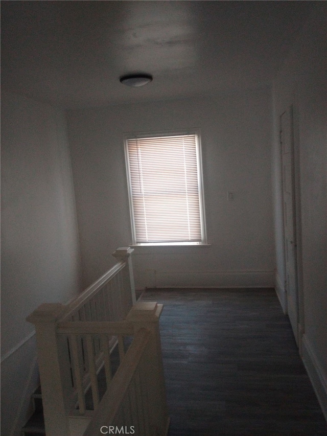 hall featuring wood finished floors