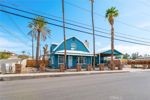 401 Cibola St, Needles, CA 92363 - view of front of home featuring a chimney and covered porch