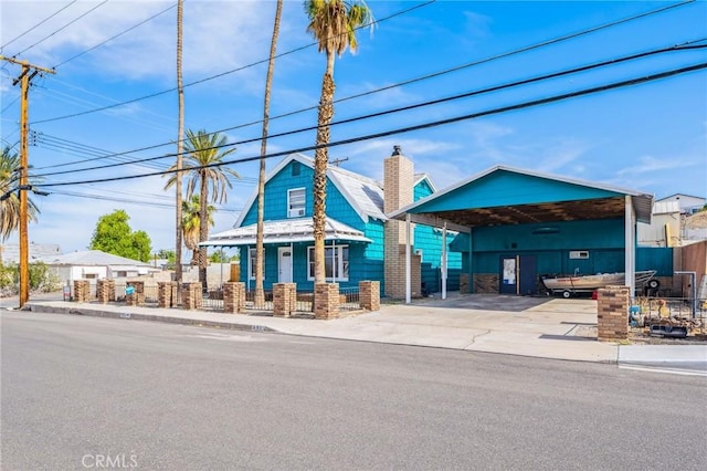 401 Cibola St, Needles, CA 92363 - view of property with a detached carport and driveway