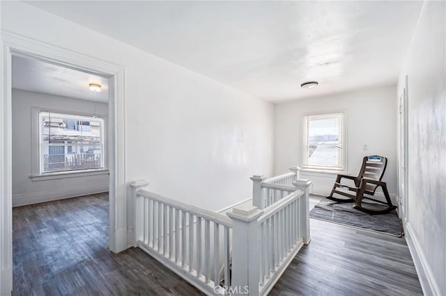 401 Cibola St, Needles, CA 92363 - corridor featuring an upstairs landing, dark wood finished floors, and baseboards