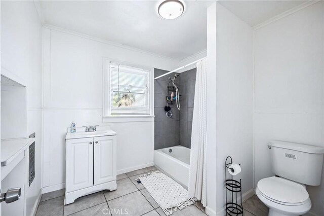 401 Cibola St, Needles, CA 92363 - full bathroom with vanity, crown molding, tile patterned floors, toilet, and shower / tub combo