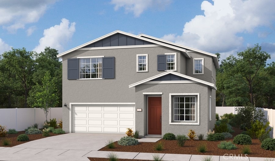 traditional-style home with fence, stucco siding, concrete driveway, a garage, and board and batten siding